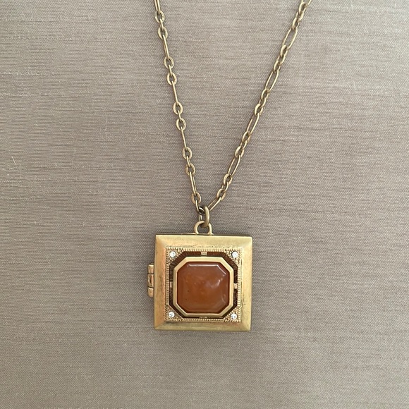 J. Crew long, antiqued gold look, locket necklace.